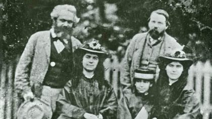 Keterangan foto: Keluarga Marx bersama Engels di London (revsock21.uk)